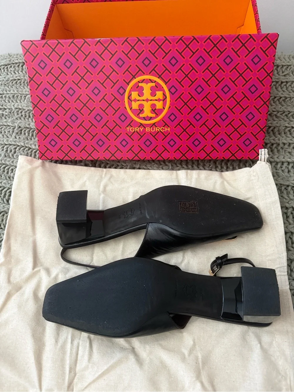 Like New!! Tory Burch Black Leather Slingback Pumps with Gold Logo Plaque.
